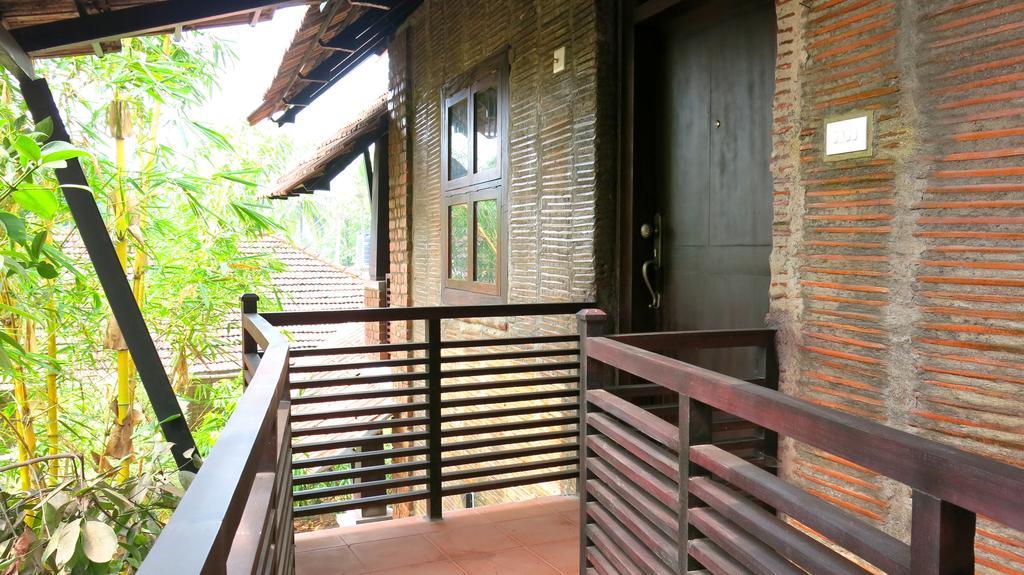 Clayfingers Art Cottage Thrissur Szoba fotó